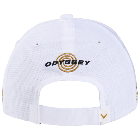 A white baseball cap is displayed with a circular logo and the text "ODYSSEY" embroidered in black and gold on the back, featuring a Velcro strap for adjustment.