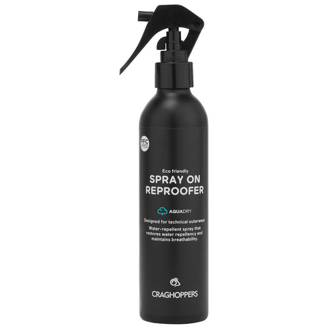 A black spray bottle labeled as eco-friendly spray on reproofer sits upright. It is designed to restore water repellency for technical outerwear.