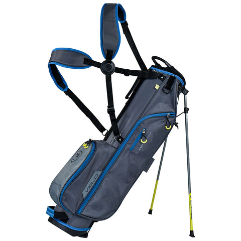 A gray and blue golf bag stands upright on two yellow legs featuring adjustable straps for carrying and pockets for storage in a setting suitable for outdoor sports.