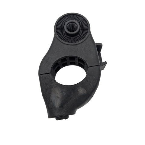 A black plastic clamp with an adjustable circular opening and threaded top is positioned upright, designed to secure objects together in a workshop or mechanical context.