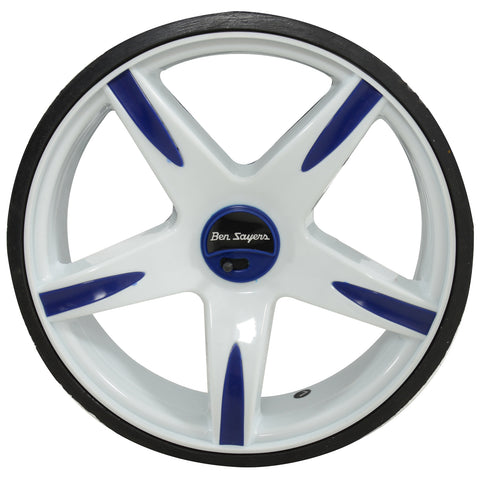 A white wheel with blue accents sits on a flat surface featuring five spokes and a black tire showcasing the text Ben Sayers in the center.