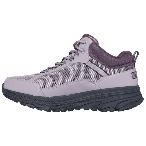 A purple and grey athletic shoe is displayed with a thick sole and textured fabric. It is designed for comfort and support in active environments.