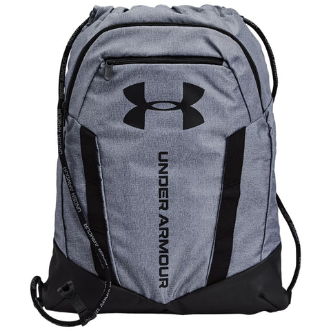 A gray drawstring backpack with black accents features the Under Armour logo prominently displayed. It is designed for carrying personal items or sports equipment and appears sturdy and functional.