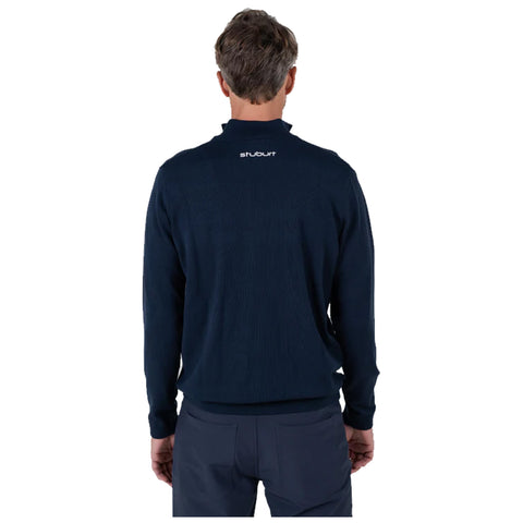 A man is wearing a dark navy sweater with a high collar and is shown from the back against a plain white background, highlighting the sweater's texture and branding.