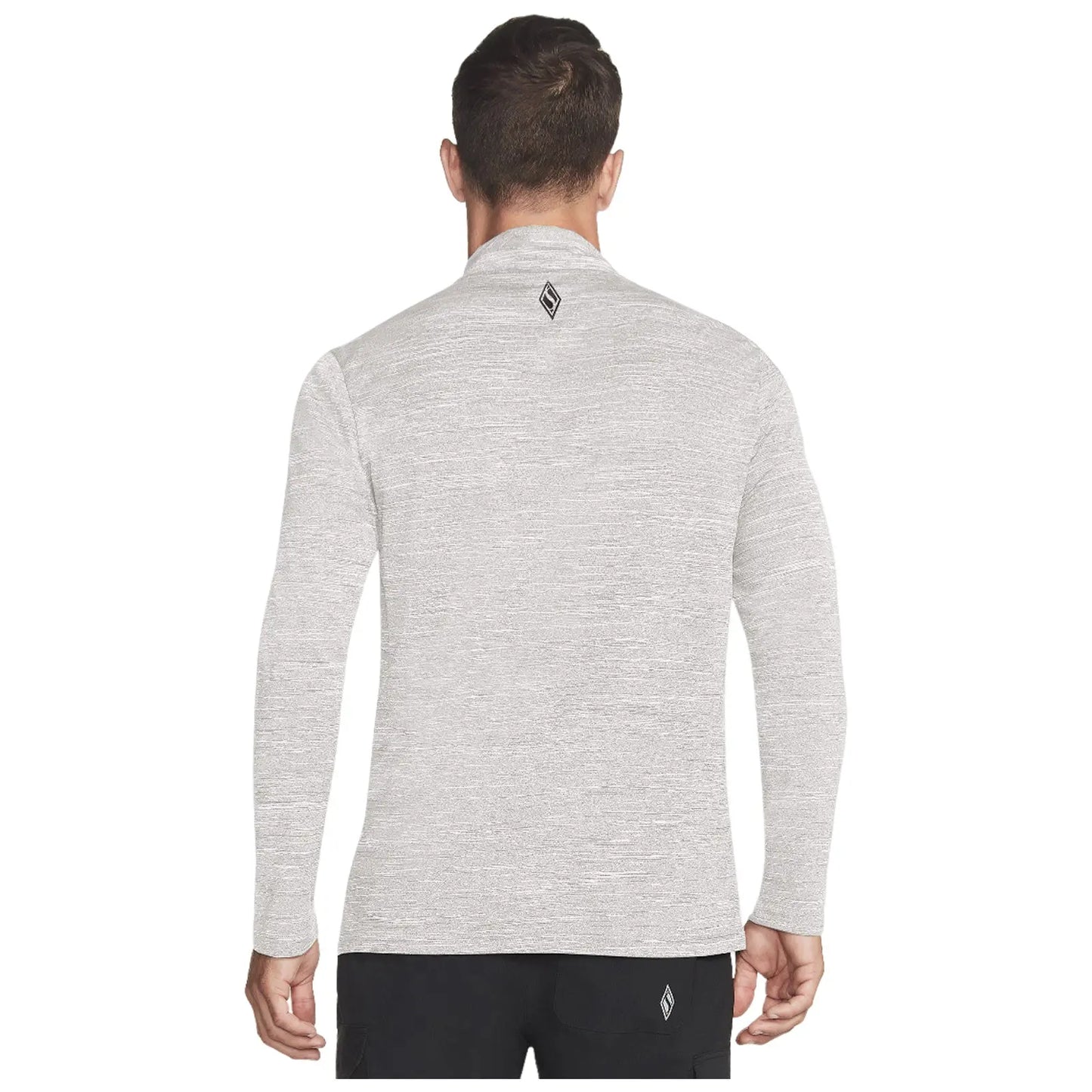 A light gray long-sleeve shirt is worn by a man viewed from the back his arms are relaxed and the background is plain and neutral with no distractions.