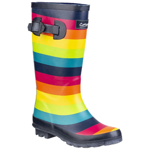A brightly colored rain boot with horizontal stripes in red yellow green blue and black stands upright showcasing its rubber material and buckle detail ideal for wet conditions.