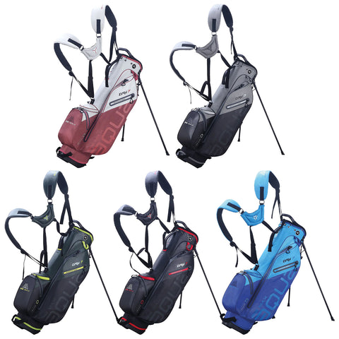 Five golf carry bags in different colors are arranged upright with shoulder straps and stand legs extended. Each bag features a sleek design suitable for carrying golf clubs.