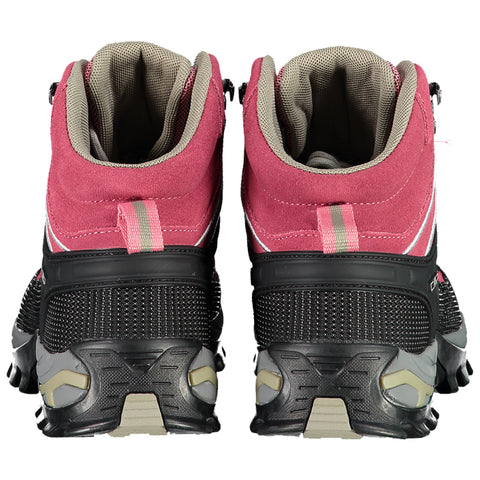 A pair of outdoor boots stands upright with a pink and black design featuring a high ankle and a textured sole suitable for rough terrain in a neutral background.