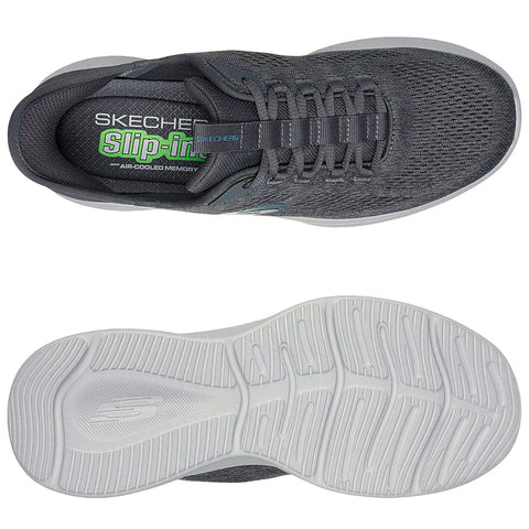A gray Skechers sneaker is displayed from above showcasing its Air-Cooled Memory insole and textured upper while the white outsole features a patterned grip design.