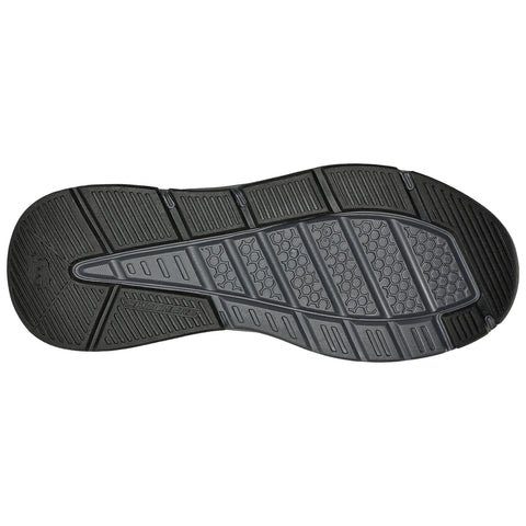 A black shoe sole is shown highlighting its textured surface with various patterns and grooves designed for grip and traction on different terrains.