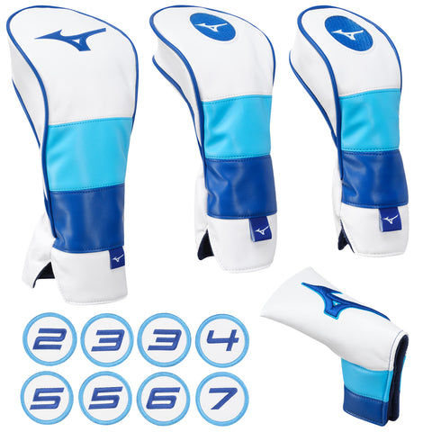 Three golf club headcovers in blue and white are arranged together with a fourth smaller headcover nearby. Below them are circular tags labeled with numbers from two to seven.