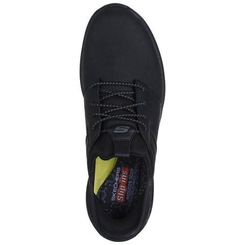 A black shoe is positioned top-down showcasing its smooth surface and laces with a small logo on the side highlighting its athletic design and comfort for active wear.