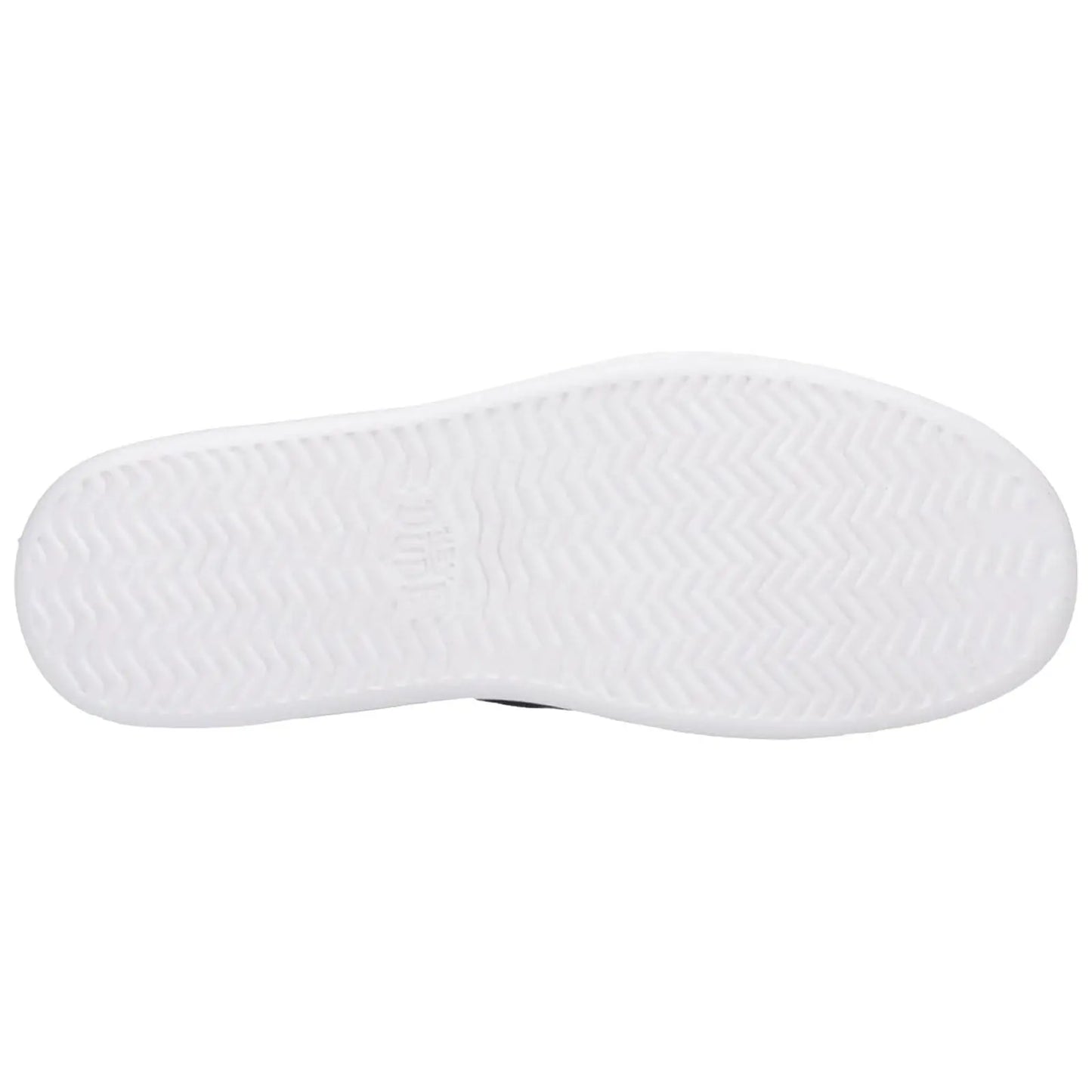 A white shoe sole rests flat showing a textured pattern designed for traction against a plain background which highlights the footwear's simple and functional design.