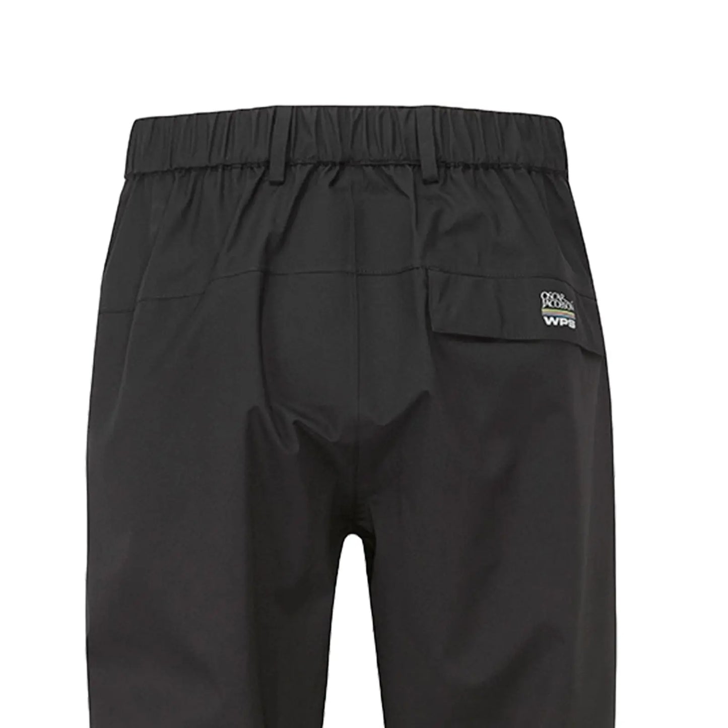 Black waterproof pants hang vertically showcasing their elastic waistband and a rear pocket with branding near the top edge in a simple undisturbed setting