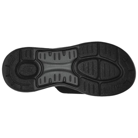 A shoe sole made of black rubber displaying a textured pattern designed for grip and stability is shown against a plain white background, emphasizing its functional features.