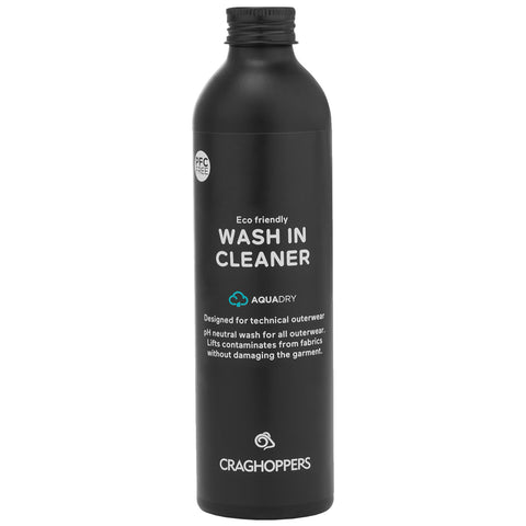 A black bottle labeled as an eco-friendly wash-in cleaner designed for technical outerwear with instructions indicating it is pH neutral and safe for all fabrics without damage.