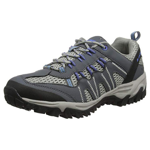 A grey and blue athletic shoe rests on a flat surface showcasing a mesh and rubber construction designed for outdoor activities featuring a textured sole for traction and support.