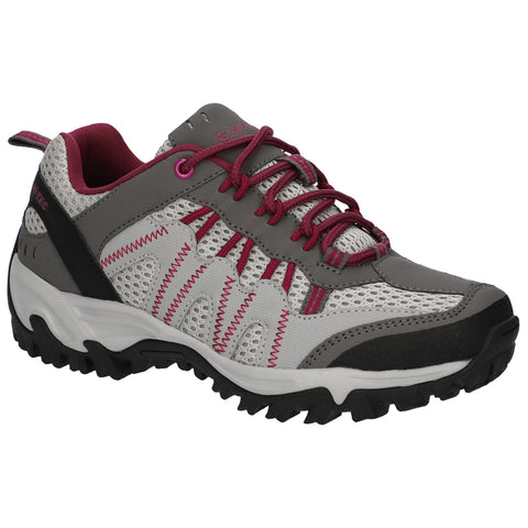A gray and pink hiking shoe is positioned at an angle displaying mesh and rubber materials with laces and a rugged tread sole designed for outdoor activities in varied terrains.