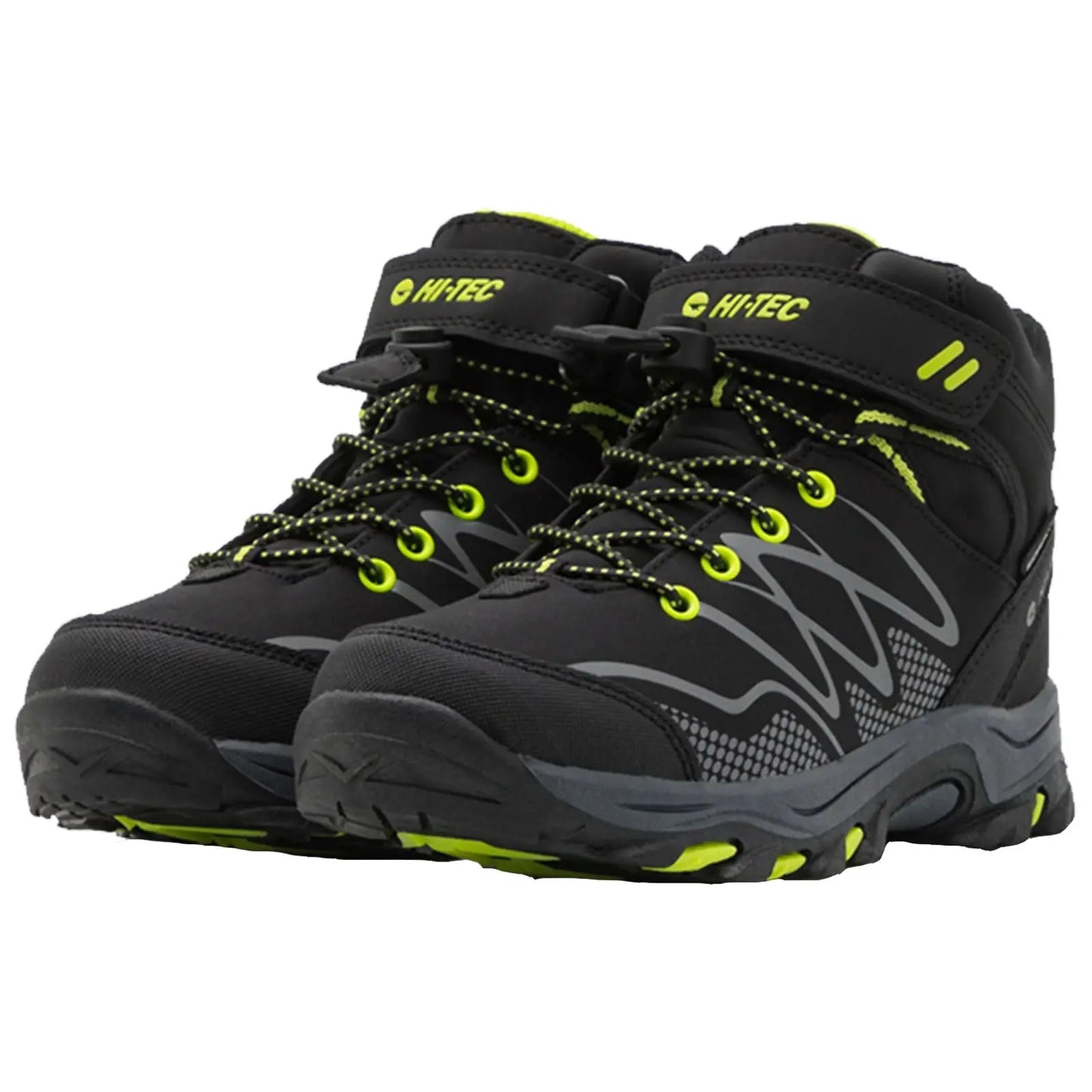 Black hiking boots with neon yellow accents are positioned together with laces threaded through metal hooks showcasing a rugged design suitable for outdoor activities in a natural environment.