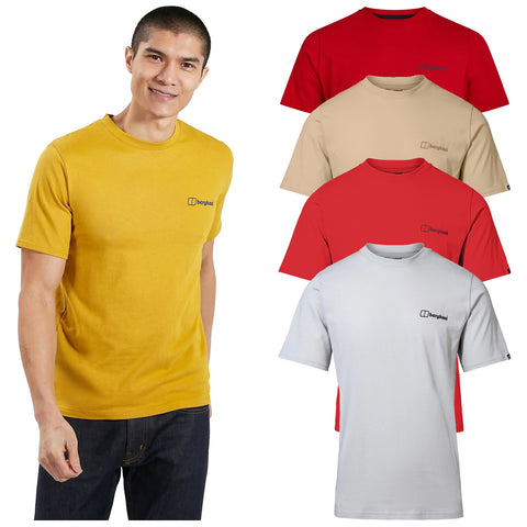A man is wearing a yellow t-shirt with a logo while posing and smiling. Four additional t-shirts in red beige and light blue are displayed behind him.