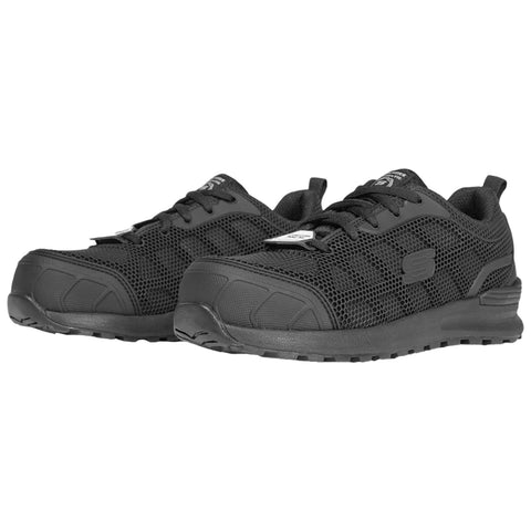 Black athletic shoes are positioned side by side showcasing a mesh upper and sturdy soles designed for support and comfort in various activities typically found in casual or active environments.