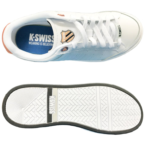 White sneaker displaying a blue accent and a logo on the side rests on a flat surface showcasing its sole design and inner insole text reading K-SWISS WEARING IS BELIEVING.