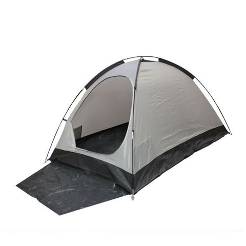 A gray and black tent stands upright with an open entrance revealing the interior floor while a black tarp extends from its base providing additional ground coverage in an undefined space.