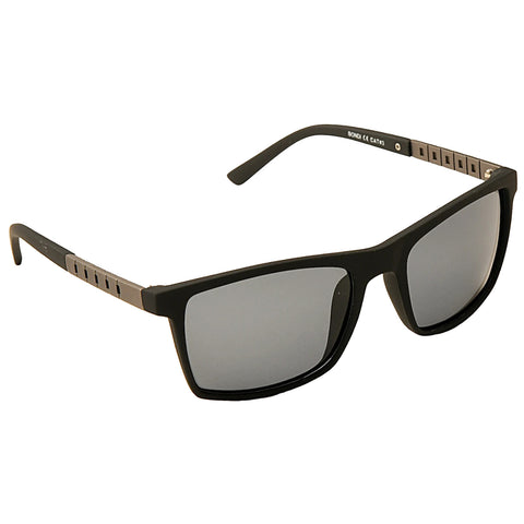 Black sunglasses with gray lenses are positioned upright against a plain background showcasing their angular design and sleek metal accents on the arms.