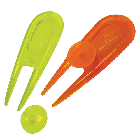 Two brightly colored plastic hair clips in green and orange lie alongside matching round silicone grips on a plain background showcasing their design and potential use for styling hair.