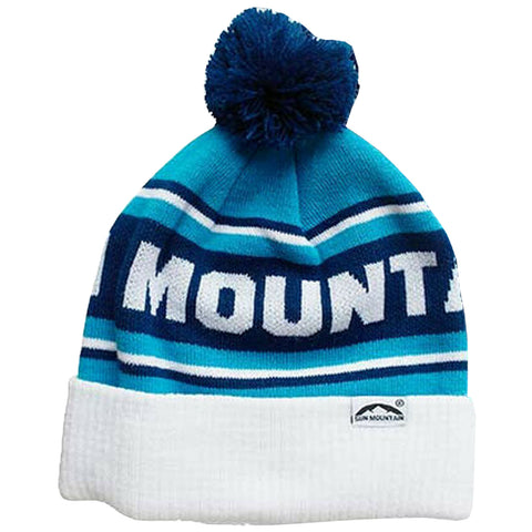 A blue and white knitted beanie with a pom-pom on top displays the text "SUN MOUNTAIN" prominently across the front and features horizontal stripes in varying shades of blue.