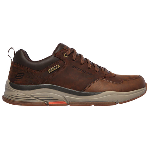 Brown waterproof sneaker features a sturdy sole and lace-up design showcasing a smooth leather upper with a cushioned midsole for comfort suitable for outdoor activities.