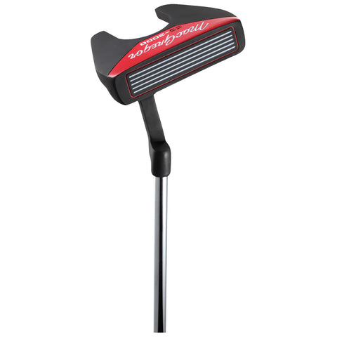 A golf putter with a black and red head and a chrome shaft stands upright showing horizontal grooves on the striking surface in a neutral background setting.