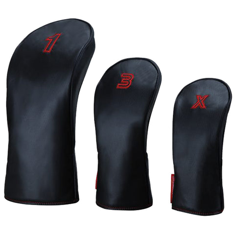 Three black golf club headcovers are displayed in varying sizes labeled 1 3 and X. They have a smooth surface and contrasting red stitching in a clean background.