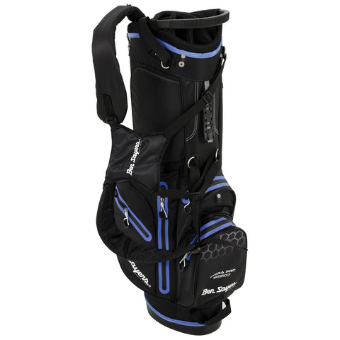A black golf bag with blue accents stands upright supported by its legs featuring multiple zippered pockets for storage and a top handle for easy carrying in a golf setting.