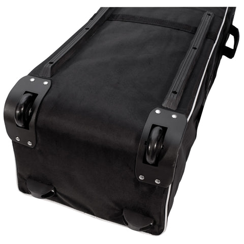 A black wheeled travel bag sits flat with solid wheels attached at the base showcasing a durable fabric design suitable for transporting belongings while traveling or during transit.