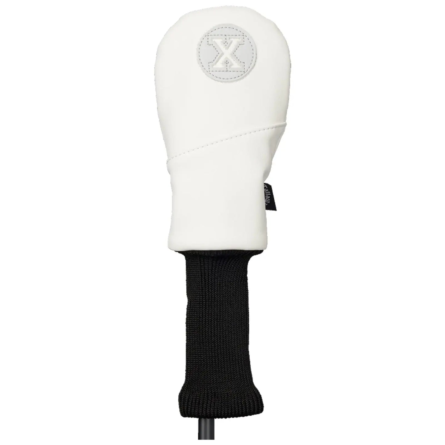 A golf club headcover is displayed standing upright featuring a white leather exterior with a circular logo and a black knitted bottom part providing protection and style for the golf club.
