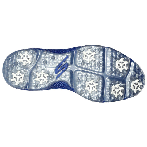 A blue athletic shoe sole features several white cleats for traction resting on a textured surface designed for sports use showcasing the brand logo in the center.