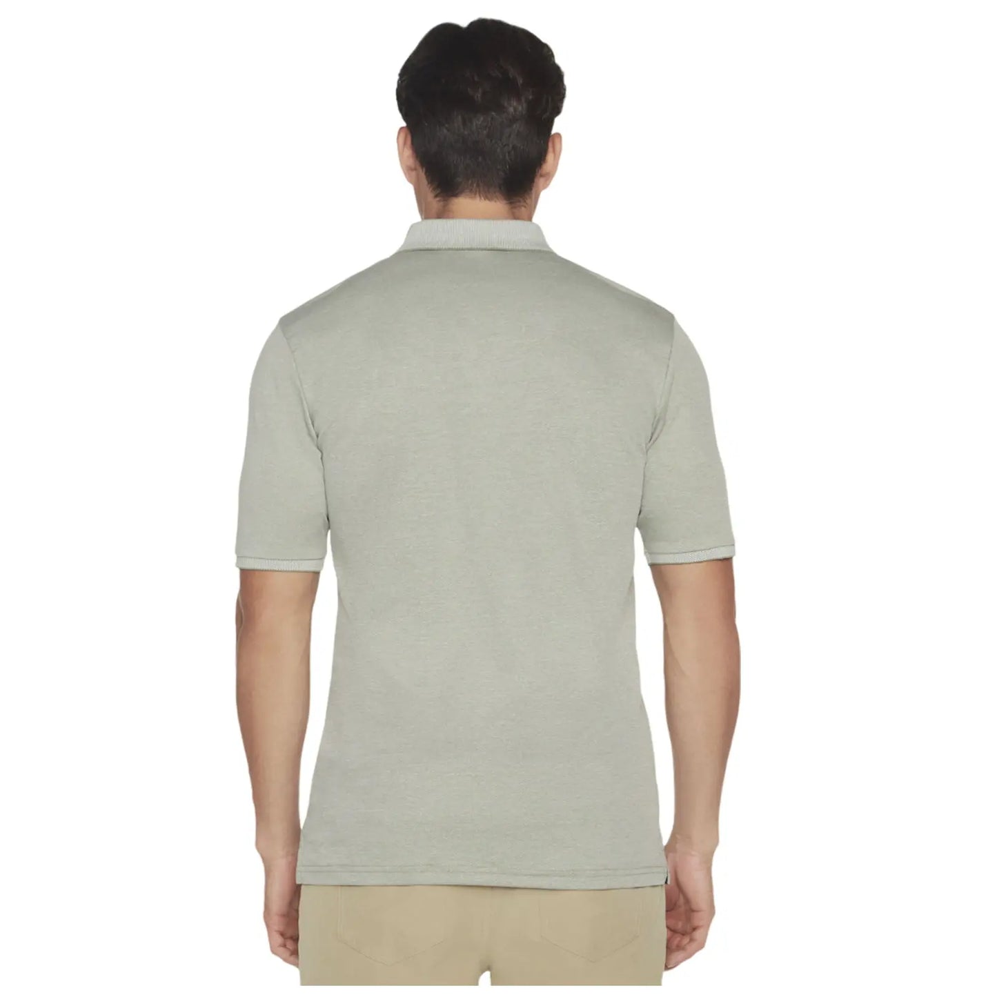 A man is wearing a short-sleeved light gray polo shirt facing away from the viewer in a simple background, emphasizing the shirt's design and fit.