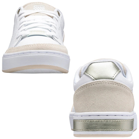 Two sneakers are shown resting on a flat surface the shoes feature a white leather upper with beige suede accents and a metallic gold heel counter the laces are tied and the shoes are oriented with one facing forward and the other slightly turned