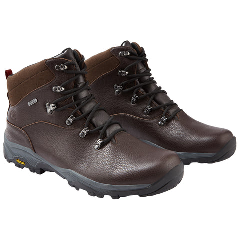 Brown hiking boots with textured leather upper are positioned side by side showcasing metal eyelets laced with black cords and a rugged sole designed for outdoor activity