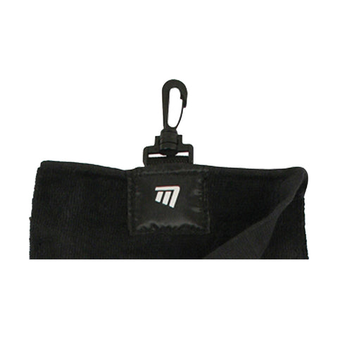 A black golf towel with a textured surface is displayed hanging from a clip at the top while featuring a rectangular label with a logo on it in the center.