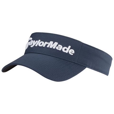 A navy blue visor sits angled with a wide brim displaying the embroidered text "TaylorMade" on the front suitable for outdoor activities like golfing in bright sunlight.