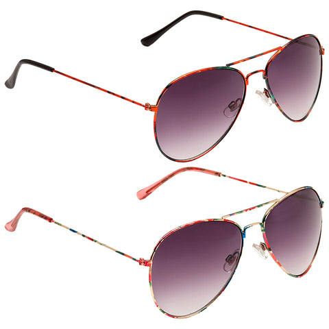 Two stylish sunglasses are displayed one above the other with colorful patterned frames and gradient lenses showcasing a blend of shades from dark at the top to lighter at the bottom.