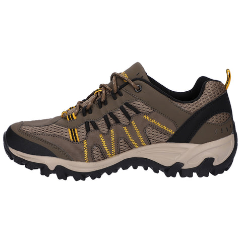 A brown and black outdoor shoe with a textured upper and a rugged sole is displayed on a white background featuring elements like yellow stitching and laces for secure fastening.