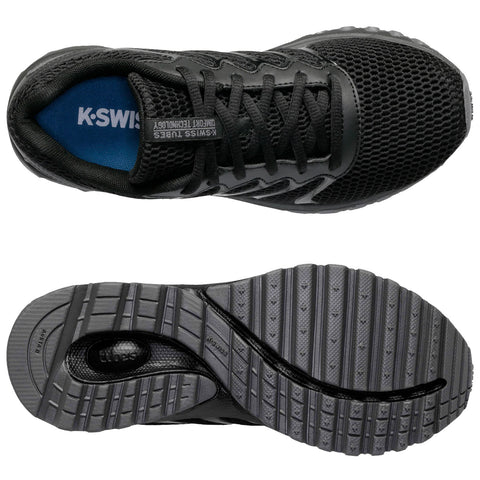 A black athletic shoe sits flat displaying its mesh upper and textured sole positioned for viewing against a neutral backdrop emphasizing its functional design and grip.