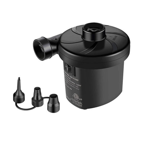 A compact black electric air pump is positioned upright with multiple nozzle attachments nearby intended for inflating items in a household or outdoor setting.