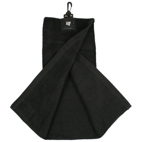 A black towel is hanging with a clip at the top and is partially folded showing its textured surface it is likely intended for use in a golf context