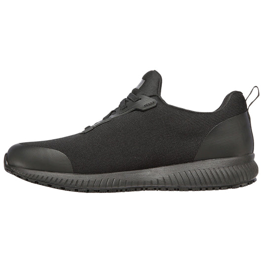 A black athletic shoe features a sleek design with a mesh upper and a rubber sole suited for running or casual wear placed against a plain background.