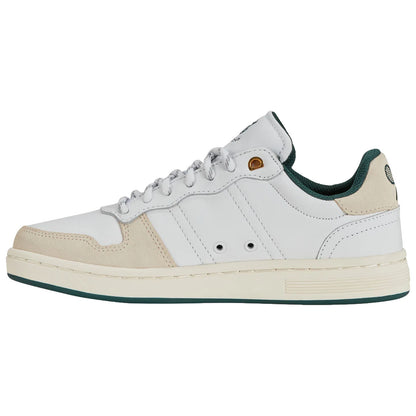 A white sneaker with beige suede accents sits upright displaying its laces and eyelets made for secure fit in a neutral setting ideal for casual wear.