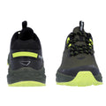 A pair of athletic shoes showcases a black and green design with laces and a pull tab on the heel positioned against a plain white background emphasizing their features.